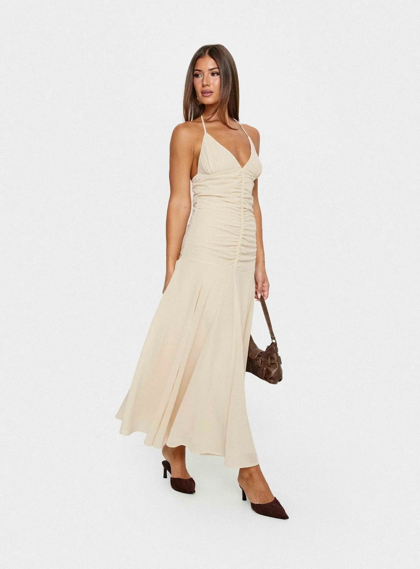 Beige Halter Prom Dress with Ruched Bodice and Flowy Mermaid Skirt for Formal Events and Prom Nights