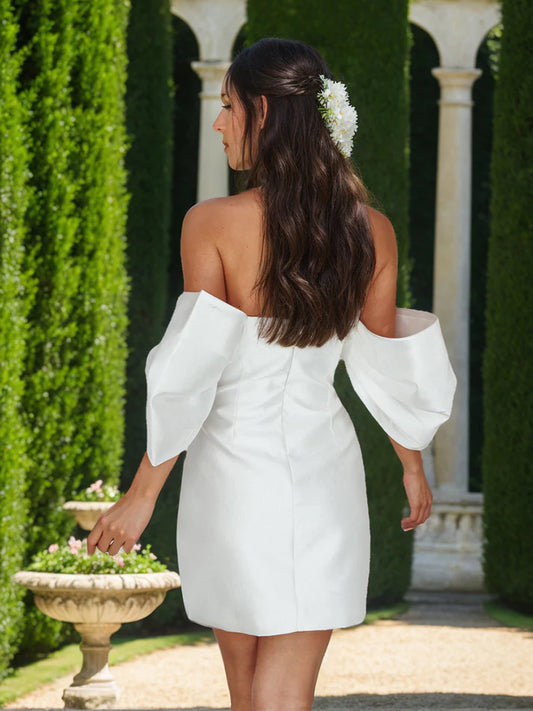 Side view of the elegant off-shoulder ruched mini homecoming dress.