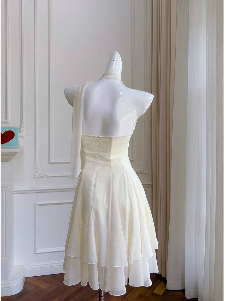 Back view of the halter neck homecoming dress, showcasing the bow detail.