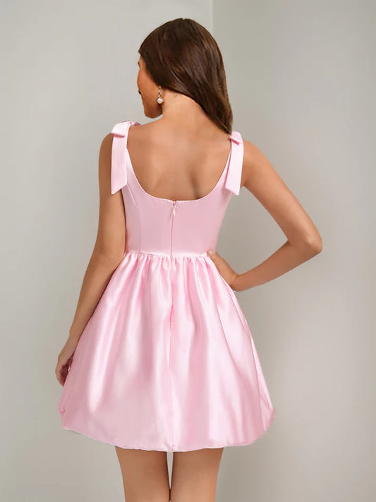 Side view of the sleeveless A-Line homecoming dress.