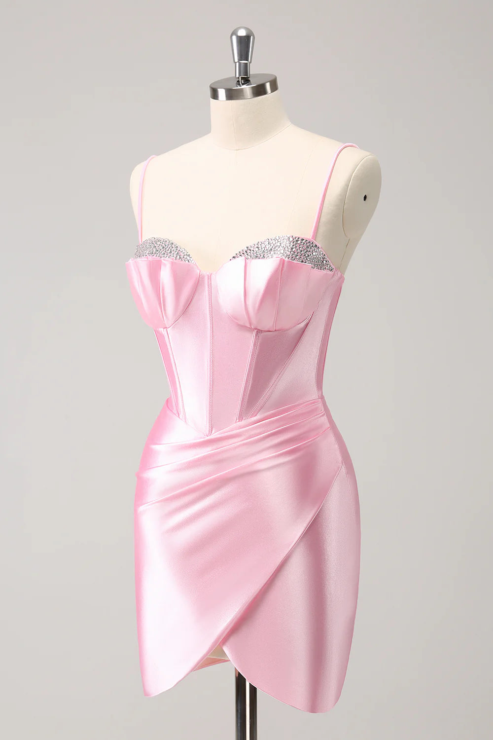 Side view of the pink floor-length homecoming dress with V-neck and beading.