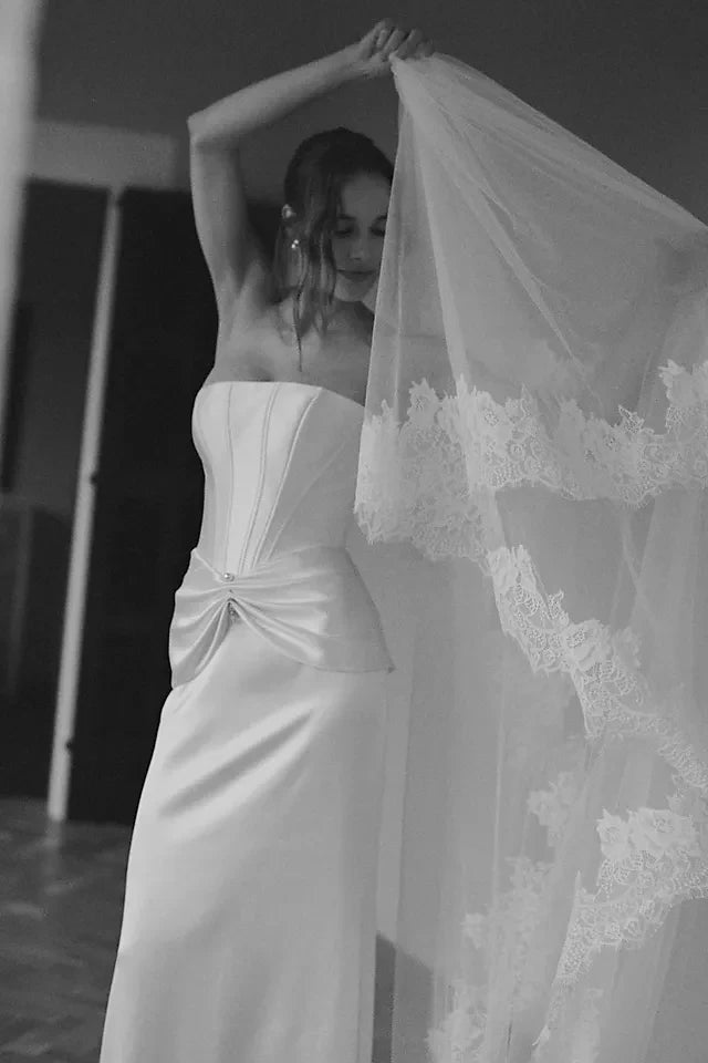 Elegant Trumpet Sweetheart Sleeveless Corset Ruched Ivory Floor-Length Wedding Gown