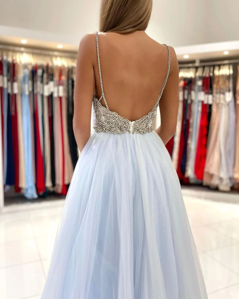 Light Blue Spaghetti Strap Prom Dress With Beaded Bodice Low Open Back And Flowy Tulle A Line Formal Prom Dress