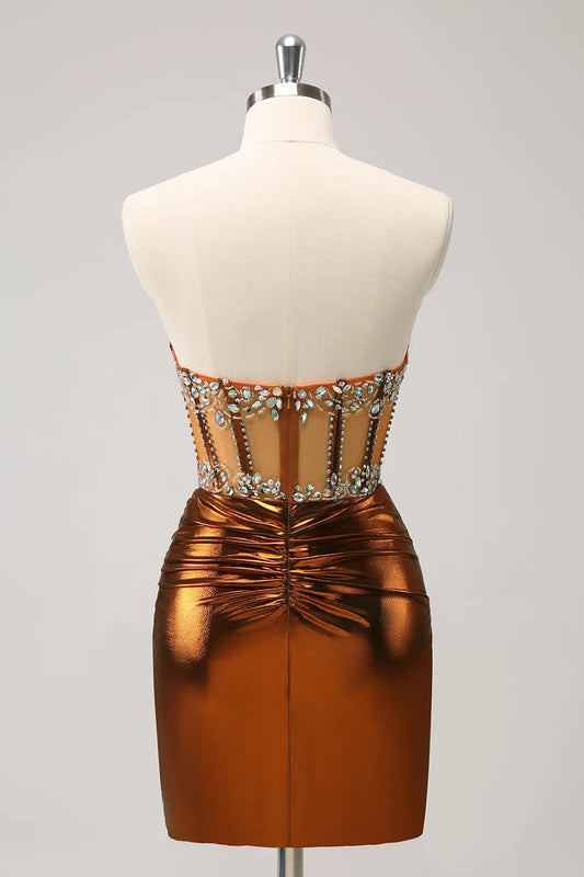 Model posing in a metallic copper strapless bodycon dress with corset detail.
