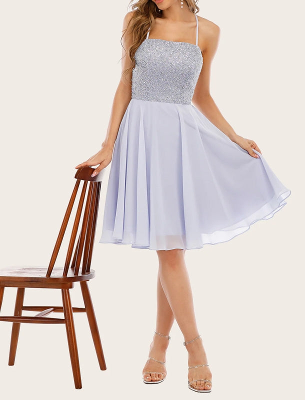 Back view of the elegant grey beaded short homecoming dress.