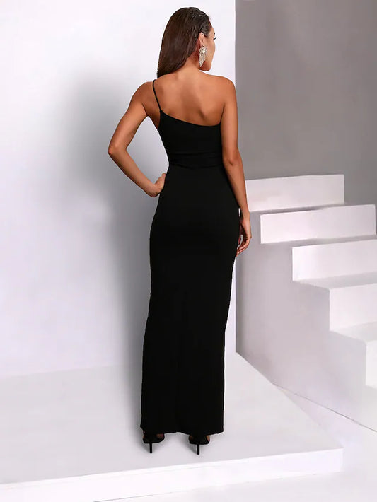 Back view of a woman in a black one-shoulder formal dress.