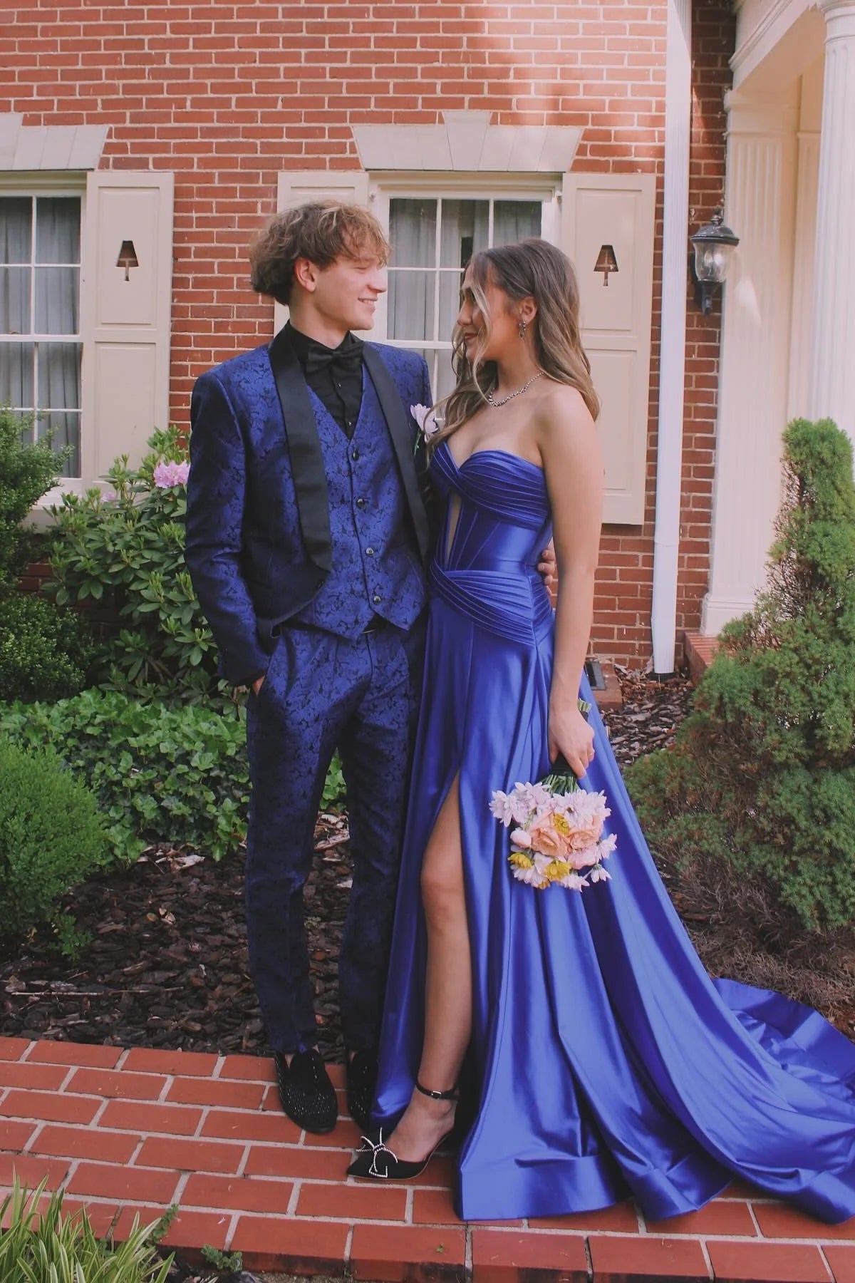 A-line maxi with satin corset strapless neckline and built-in bra slit ball gown
