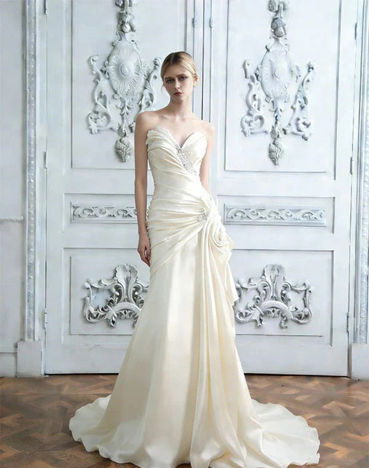 Elegant Champagne Strapless Ruched Satin Mermaid Wedding Gown