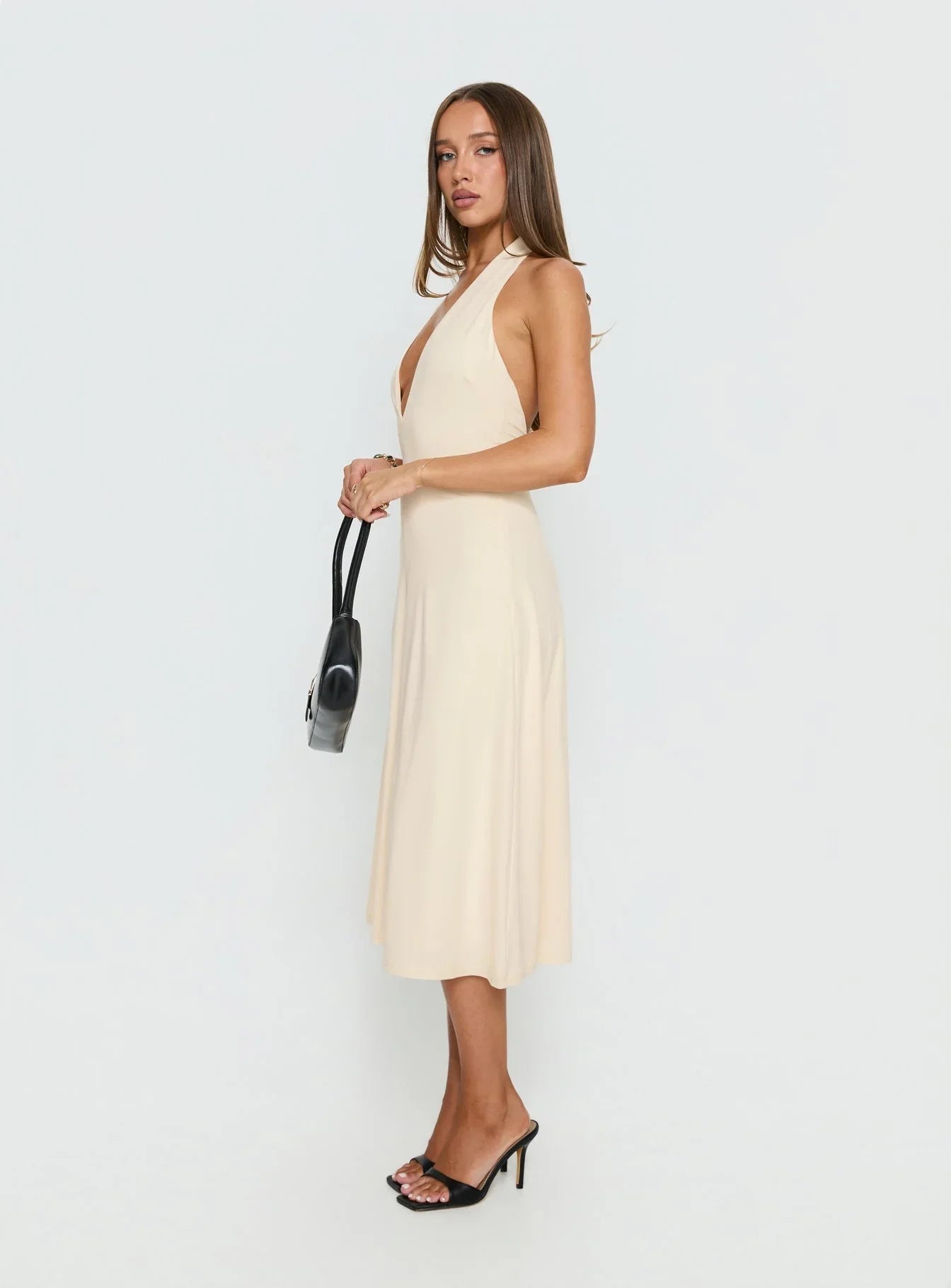 Beige Halter Prom Dress with Deep V Neckline and Flowy Midi Skirt for Formal Events and Prom Nights
