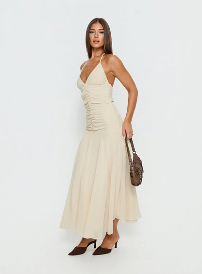 Beige Halter Prom Dress with Ruched Bodice and Flowy Mermaid Skirt for Formal Events and Prom Nights