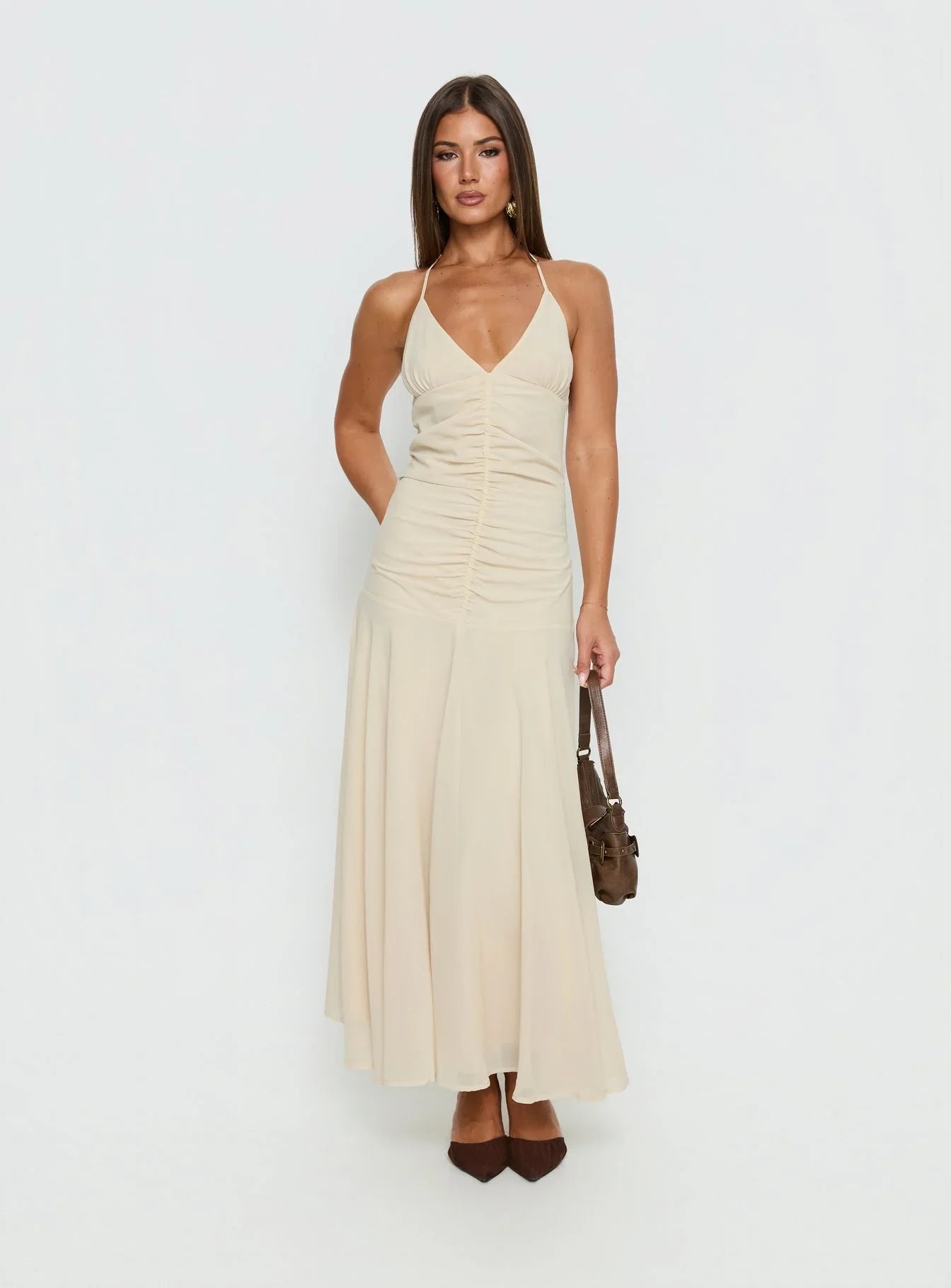 Beige Halter Prom Dress with Ruched Bodice and Flowy Mermaid Skirt for Formal Events and Prom Nights