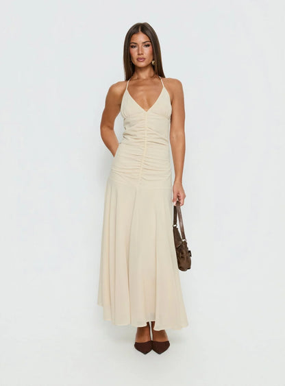 Beige Halter Prom Dress with Ruched Bodice and Flowy Mermaid Skirt for Formal Events and Prom Nights