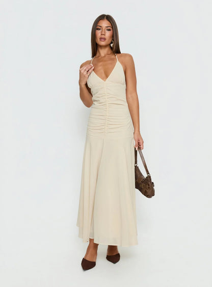 Beige Halter Prom Dress with Ruched Bodice and Flowy Mermaid Skirt for Formal Events and Prom Nights