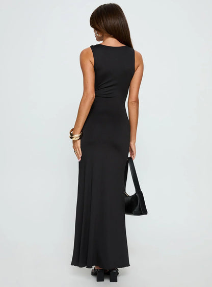 Black Sleeveless Prom Dress with Gold Flower Detail and Mermaid Silhouette for Formal Events and Prom Nights
