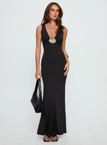 Black Sleeveless Prom Dress with Gold Flower Detail and Mermaid Silhouette for Formal Events and Prom Nights