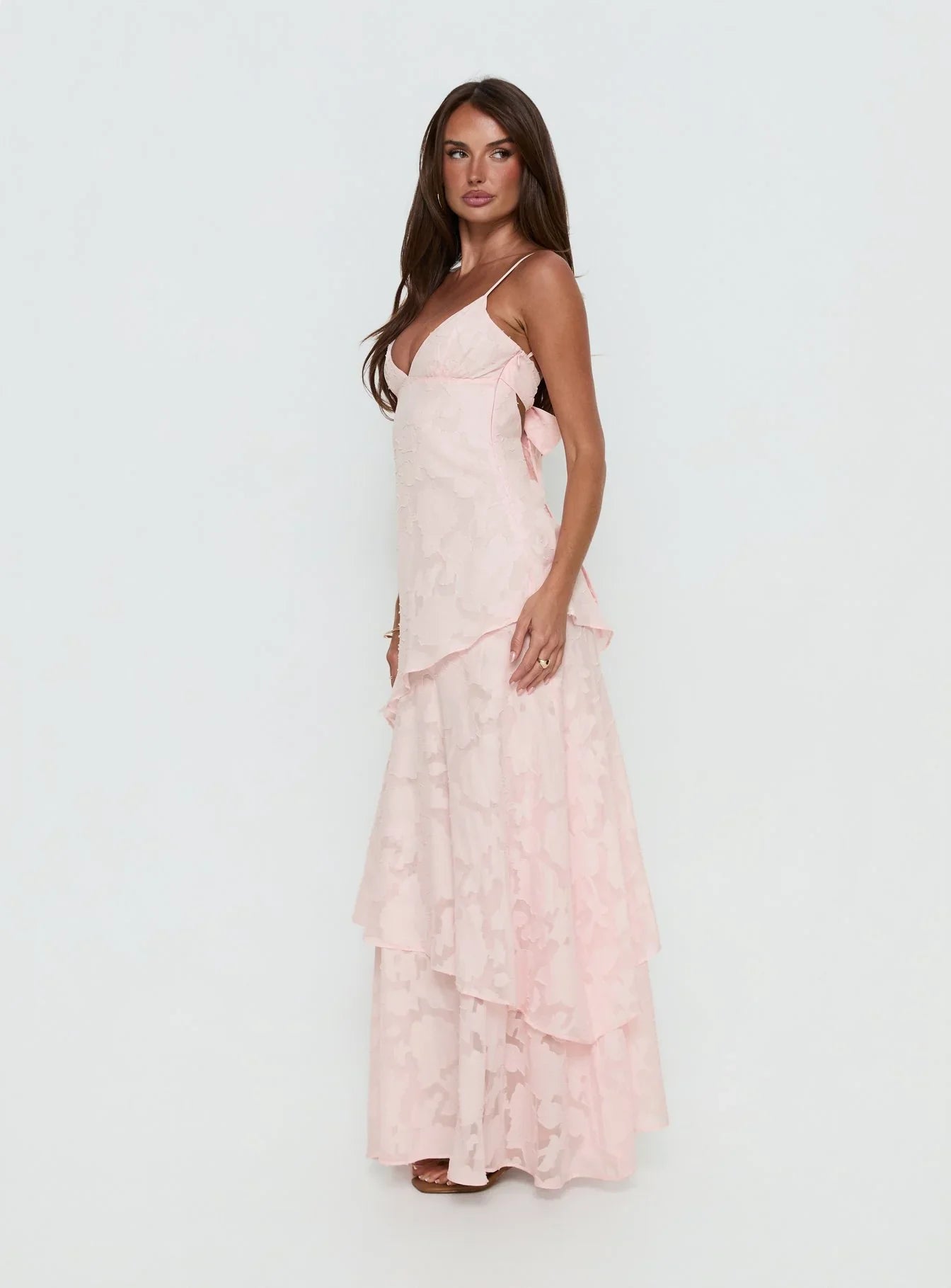 Blush Pink Spaghetti Strap Prom Dress with Floral Textured Fabric and Tiered Skirt for Formal Events and Prom Nights