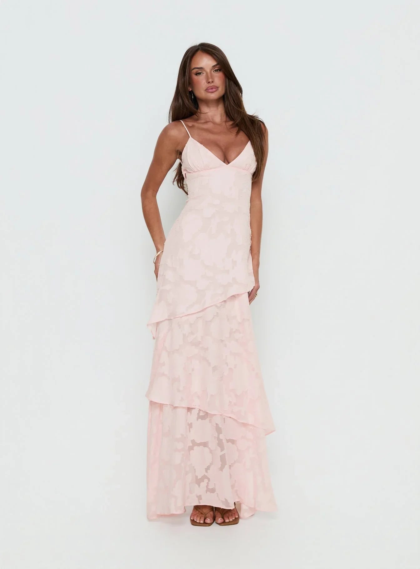 Blush Pink Spaghetti Strap Prom Dress with Floral Textured Fabric and Tiered Skirt for Formal Events and Prom Nights