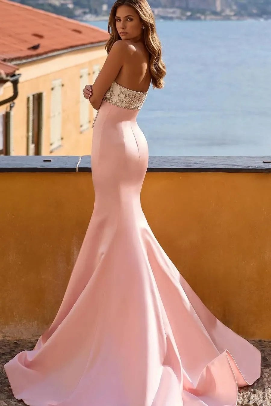 Blush Pink Strapless Mermaid Prom Dress with Beaded Bow Bodice for Formal Events and Prom Nights