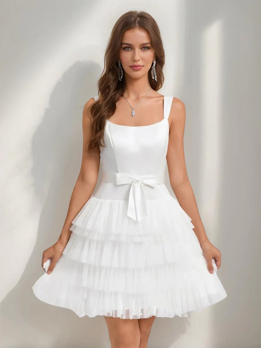 A-line princess short homecoming dress with square neckline and bow detail.
