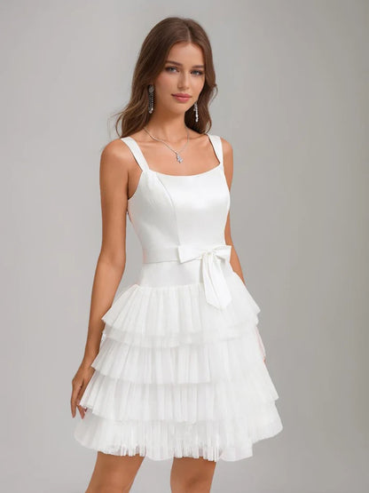 Close-up of the bow detail on the A-line princess short homecoming dress.