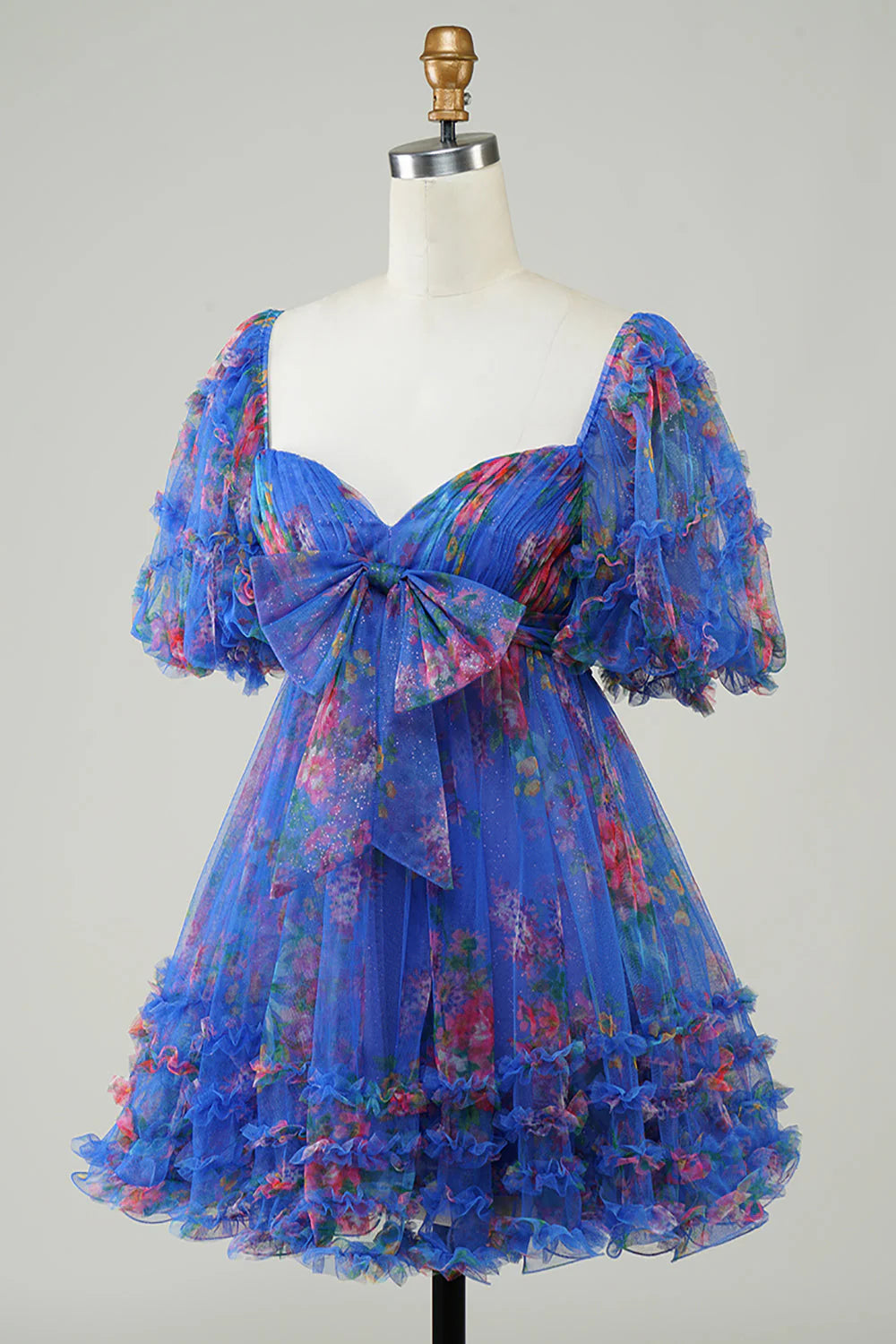 Close-up of the floral print and tulle fabric on the dress.