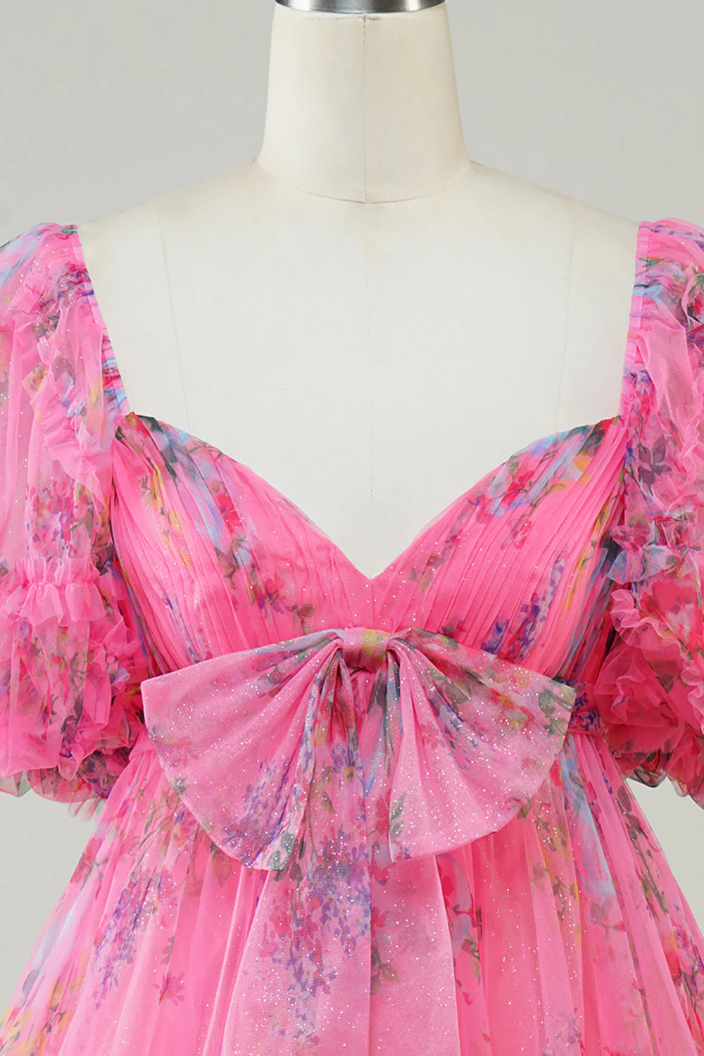 Knee-length A-line dress with floral pattern, suitable for homecoming.
