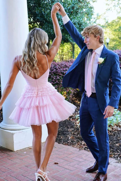 Side view of the pink tulle A-Line homecoming dress.
