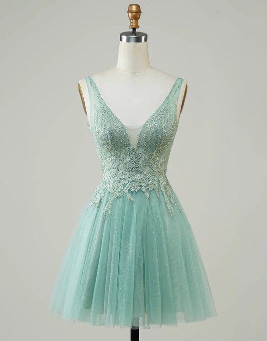 Model wearing a blue A-line V-neck homecoming dress with appliques.