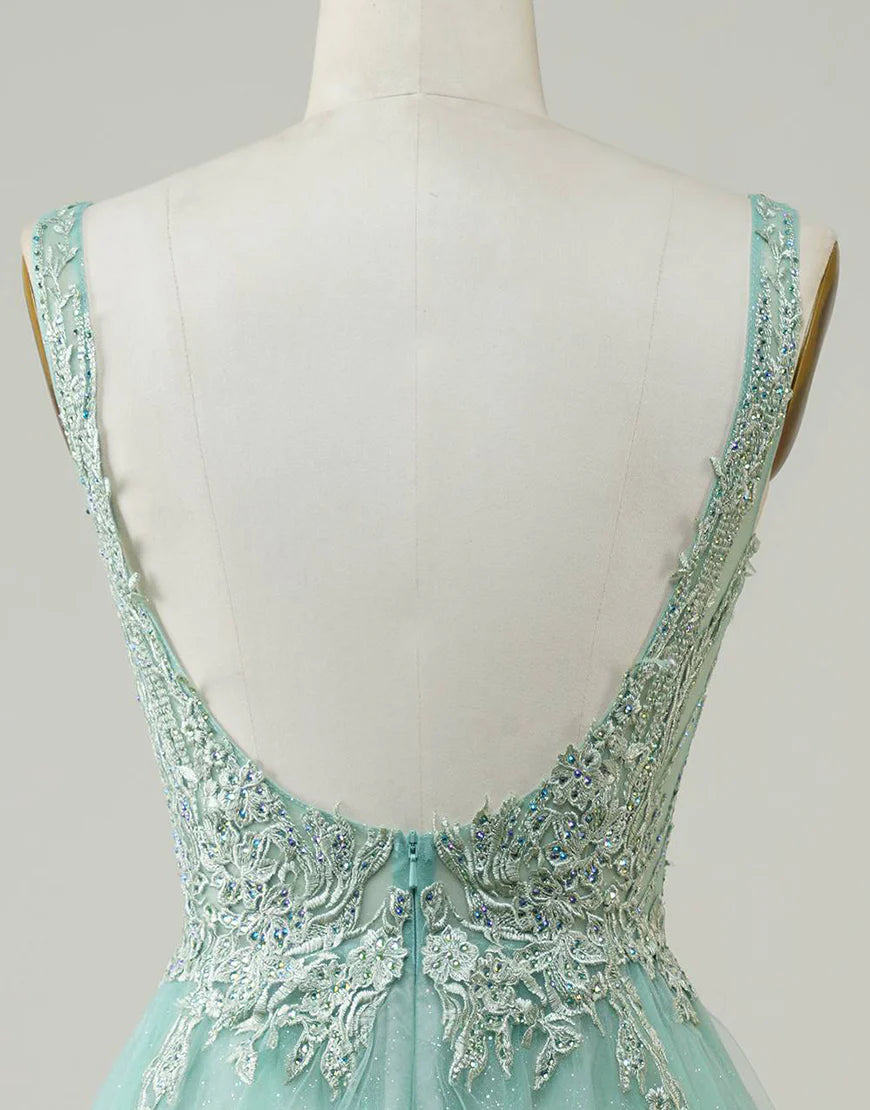 Close-up of the delicate appliques on an A-line V-neck dress.