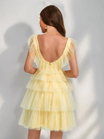 Back view of A-Line V-neck tulle short homecoming dress with ruffles.