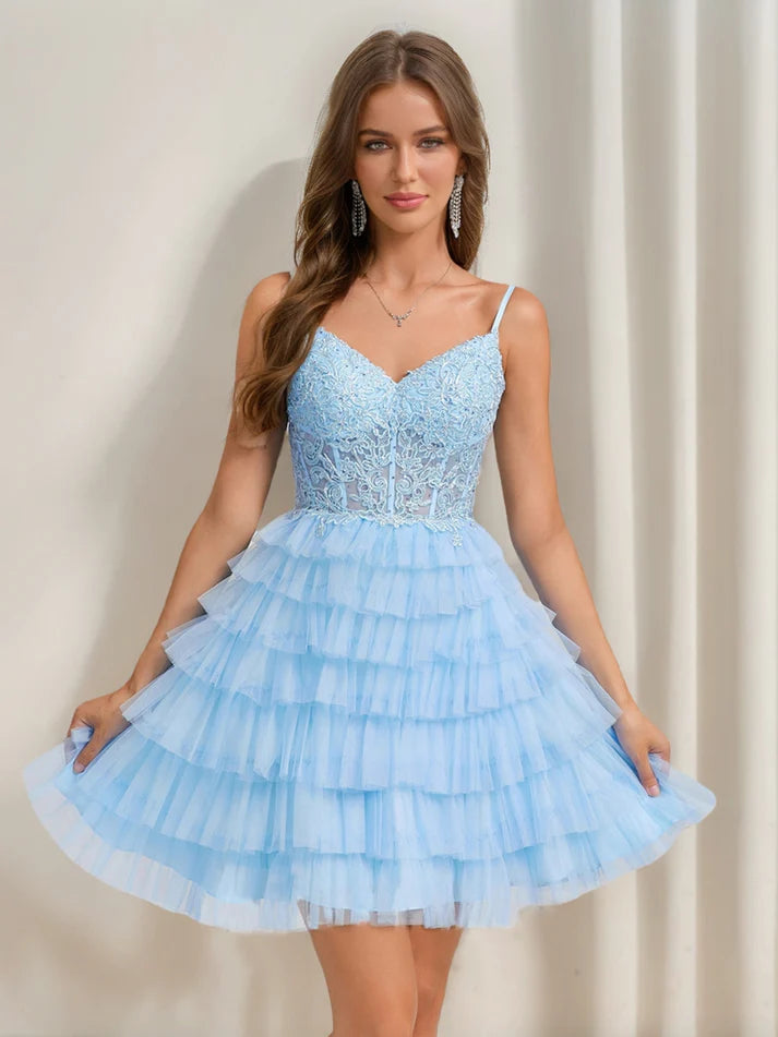 Front view of a charming A-Line V-neck short homecoming dress with ruffle tiers and appliques.