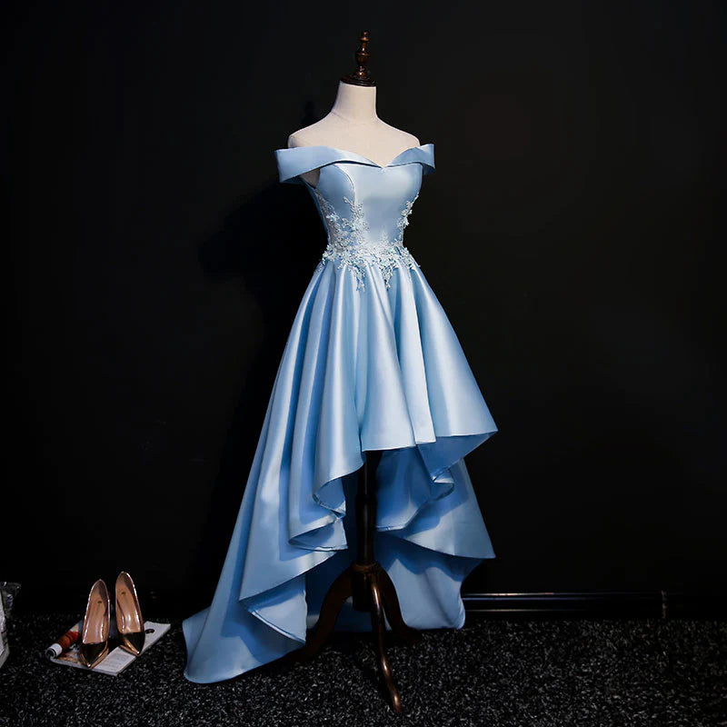 Back view of the light blue high-low formal dress, showing the elegant train.