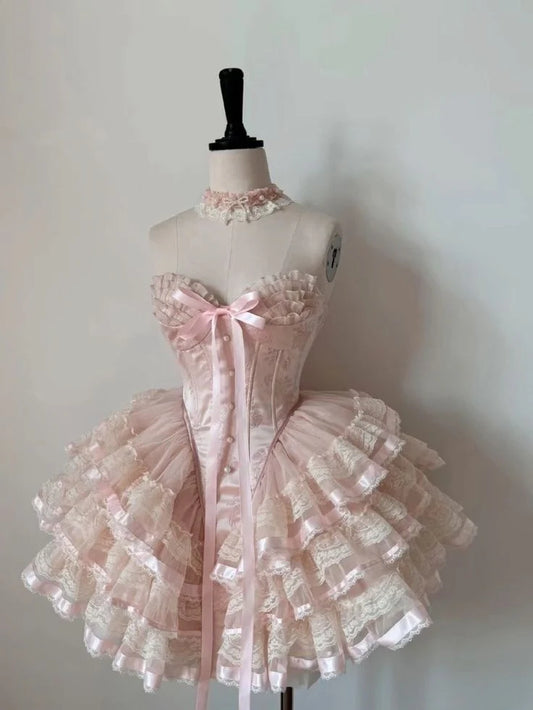 Pink halter corset mini dress with tiered lace ruffled skirt.
