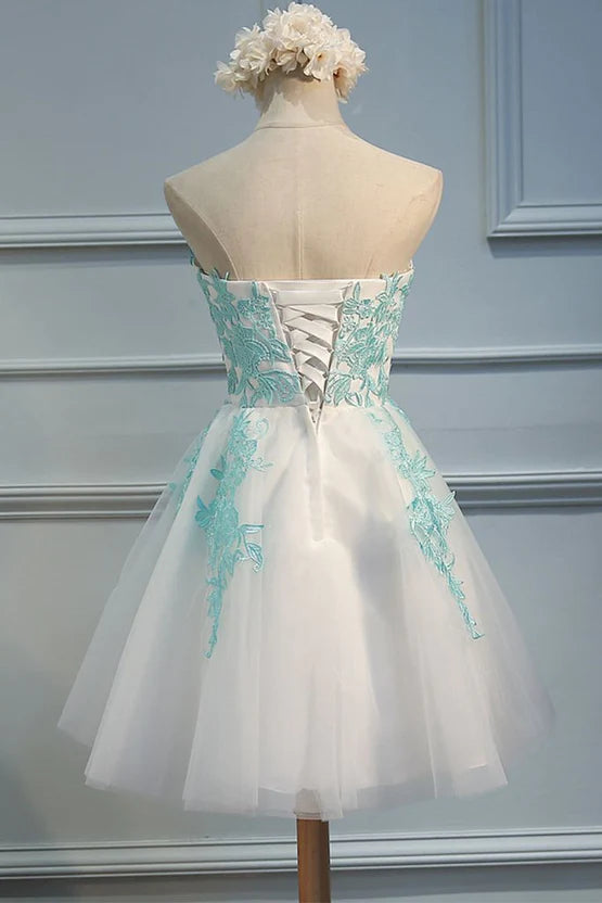 Back view of the white tulle homecoming dress.
