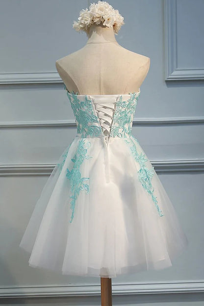 Back view of the white tulle homecoming dress.