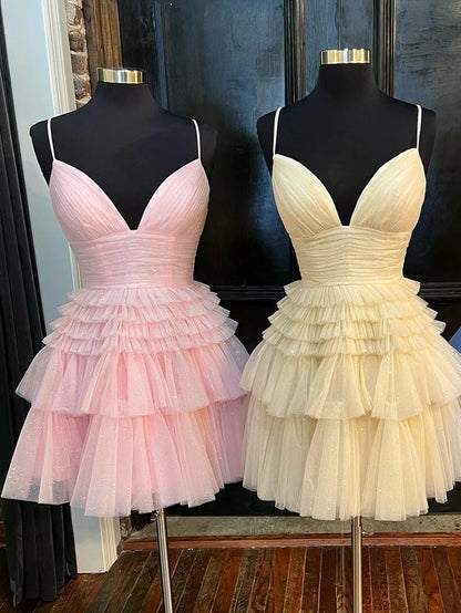 Side view of the A-line short tiered dress, showcasing its elegant silhouette.