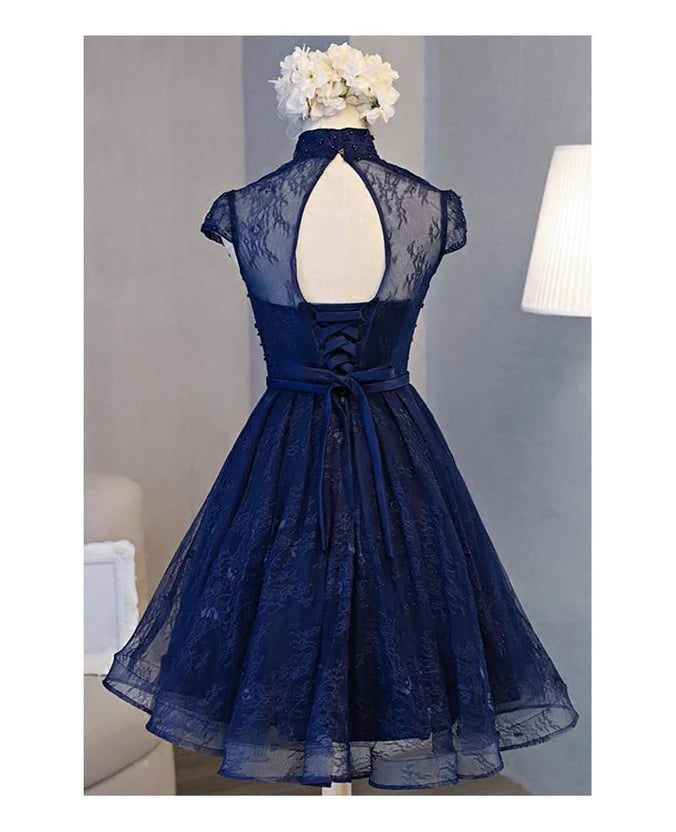 Back view of the dark navy high neck lace short dress showing the lace-up detail.