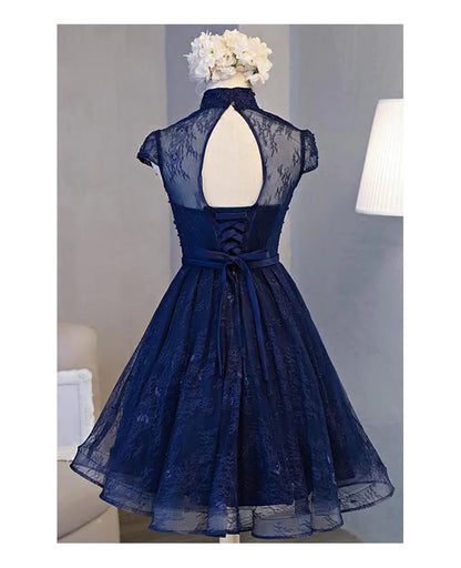 Back view of the dark navy high neck lace short dress showing the lace-up detail.