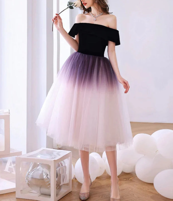 Close-up of the gradient purple tulle fabric and off-shoulder design.