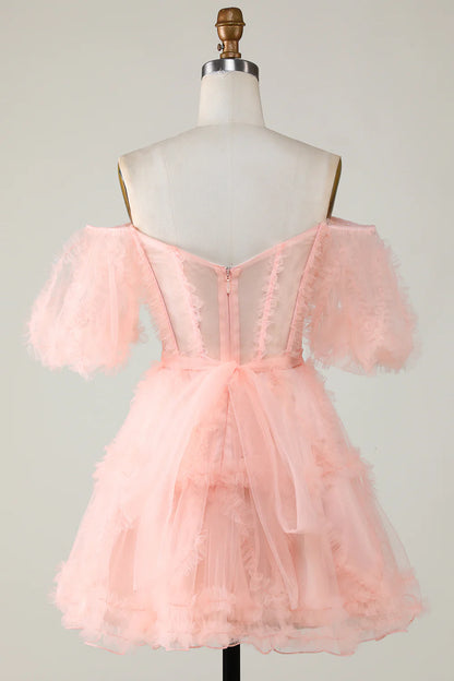 Detailed view of the layered pink tulle skirt.