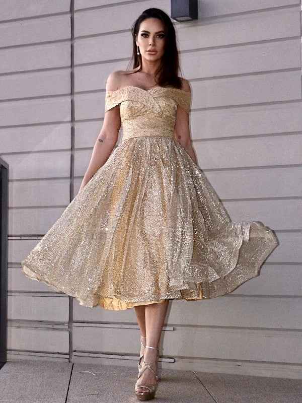 Front view of an A-Line Princess ruched off-shoulder tea-length homecoming dress.