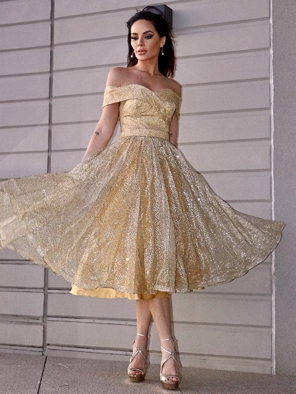 Back view of an A-Line Princess ruched off-shoulder tea-length homecoming dress.