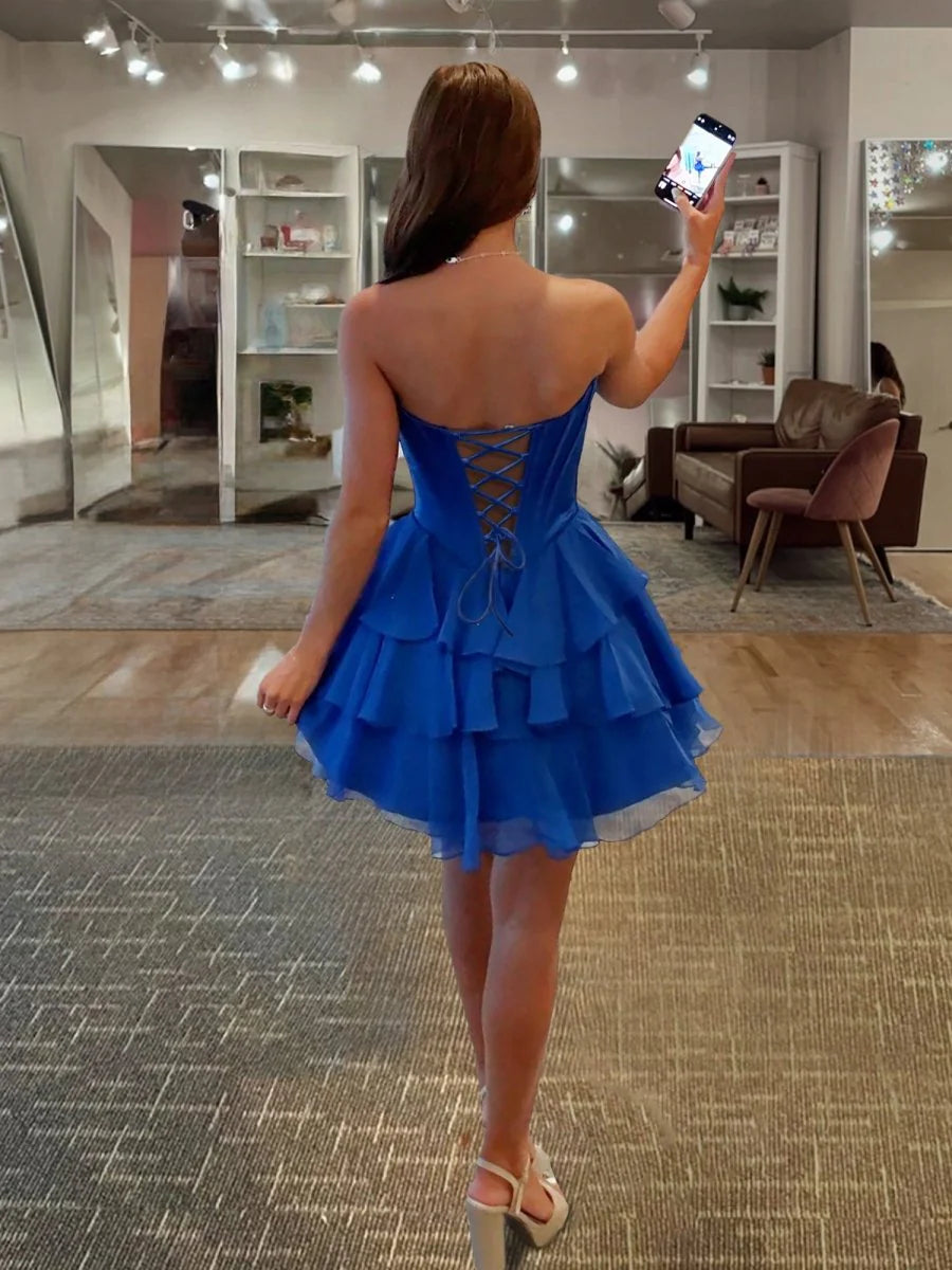 Back view of the A-line sweetheart dress with applique details.