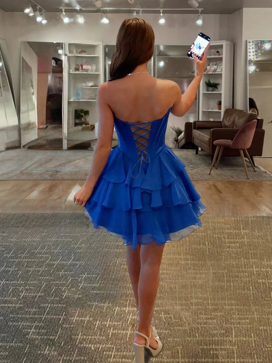 Back view of the A-line sweetheart dress with applique details.