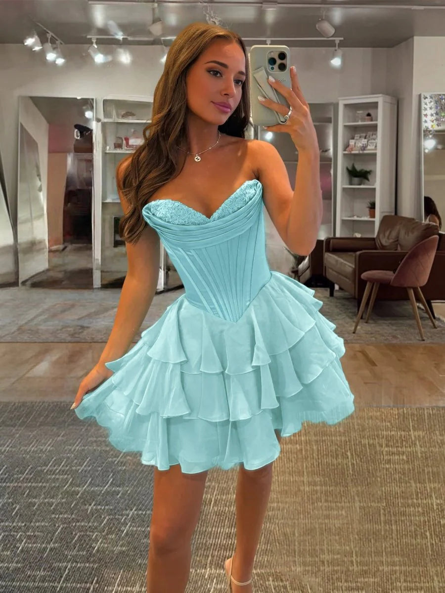 Model posing in the short A-line homecoming dress.