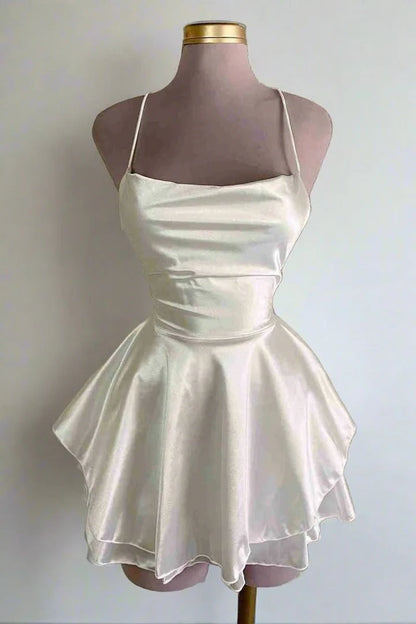 Spaghetti strap satin empire-waist short homecoming dress.