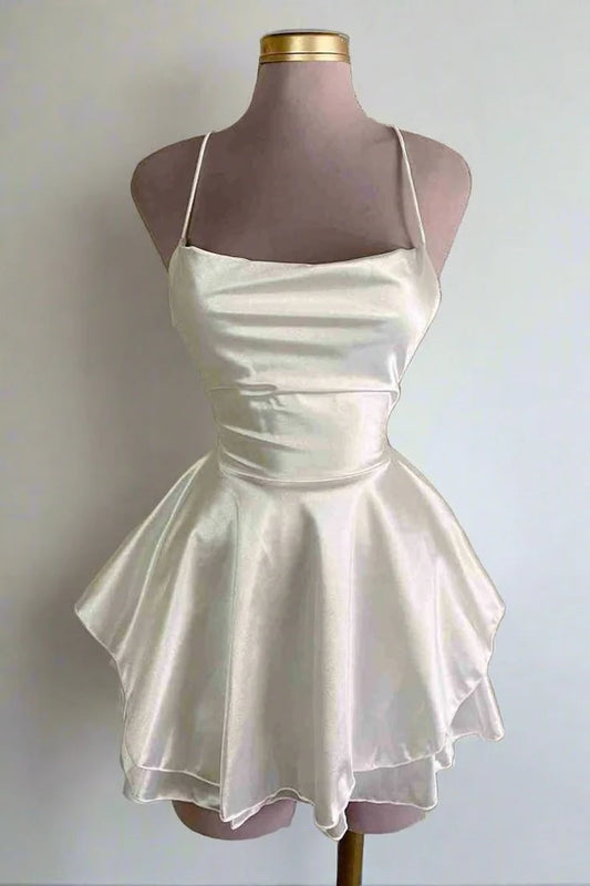 Spaghetti strap satin empire-waist short homecoming dress.