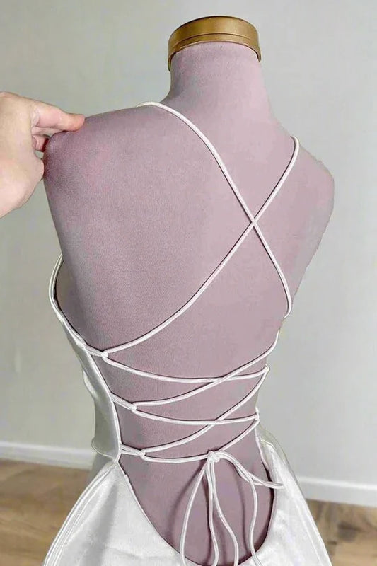Back view of satin empire-waist party dress.