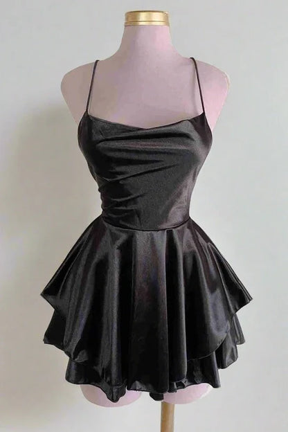 Side view of short spaghetti strap dress.