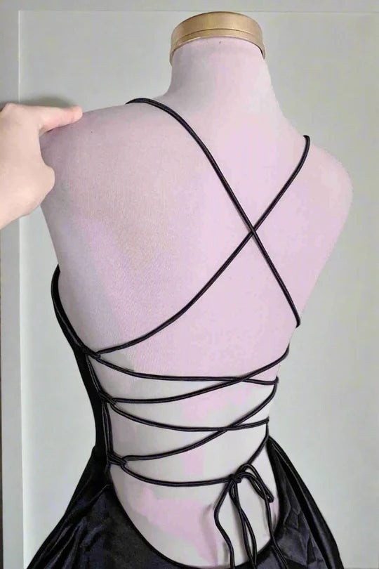 Close-up of satin fabric and empire waist detail.